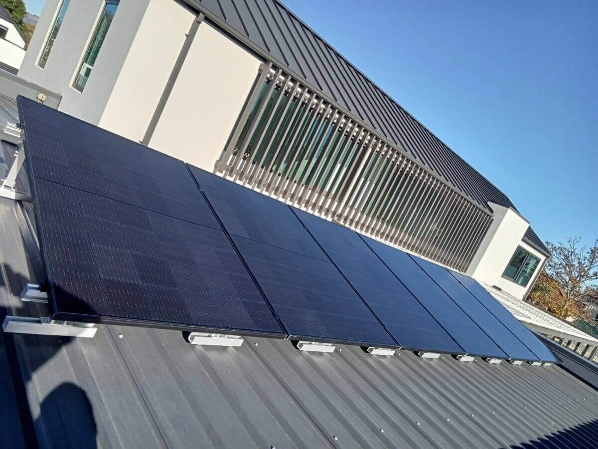 Close view of a neatly installed rooftop solar array